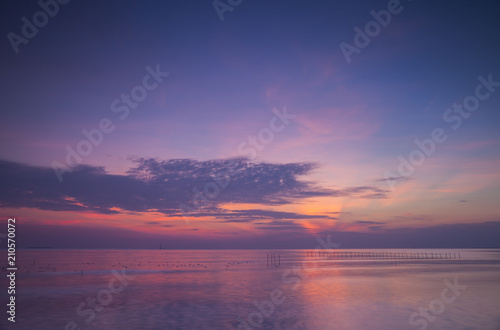 Beautiful sunset landscape view on sea and boat with colorful of sky located eastern of in Thailand © pattierstock