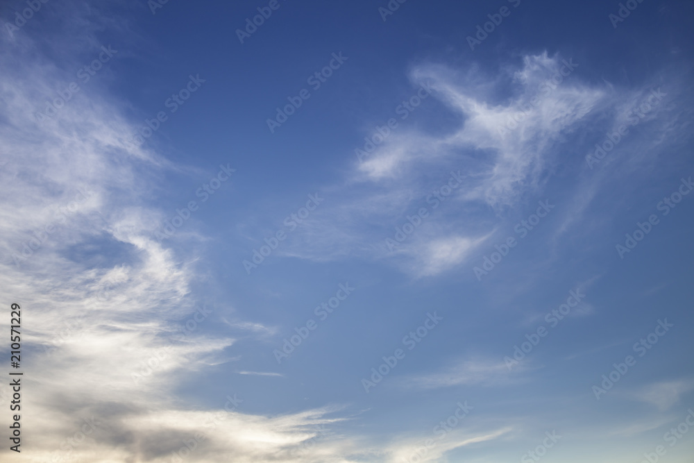 A nature of clear sky blue color with soft white cloudy 