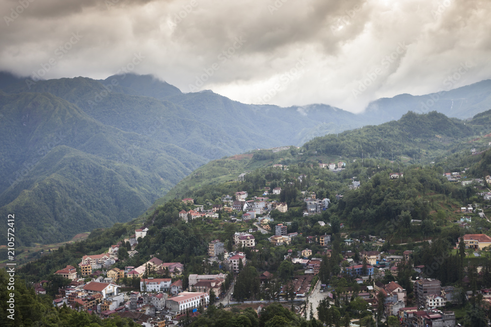 View  of village from top of mountain with mountain background located at sapa Vietnam