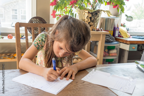 Girl writing  letter to girlfriend