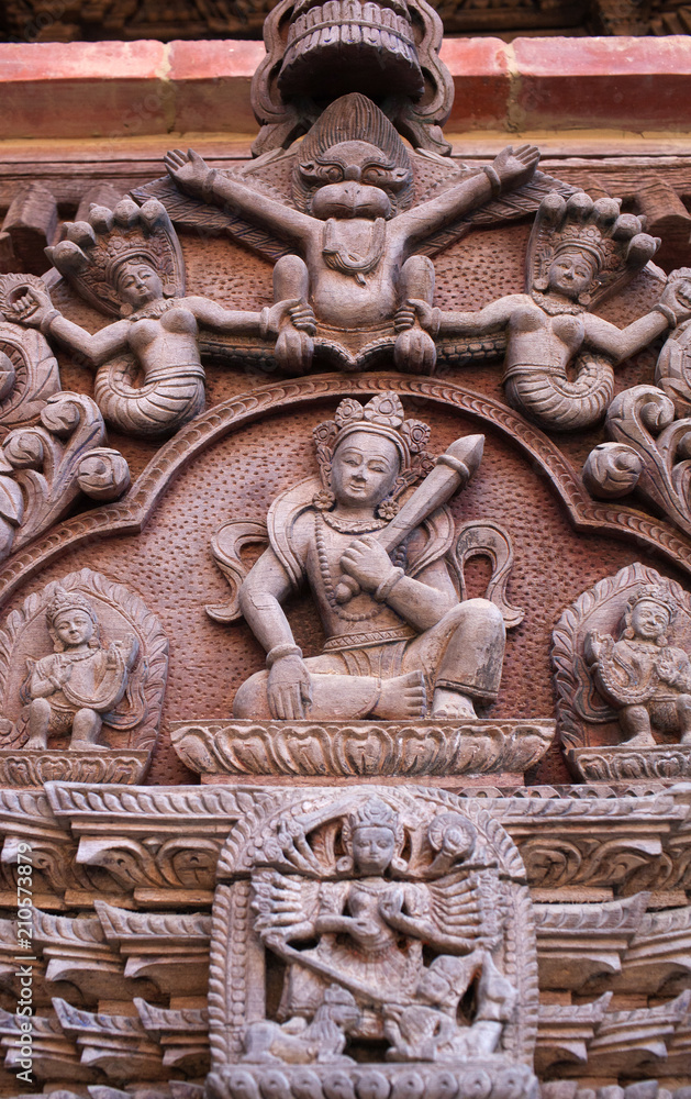 Ancient wooden bas-relief at Palace on Durbar Square in Patan, Kathmandu Valley, Nepal