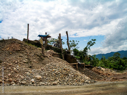 River bank in Peru with gold mining