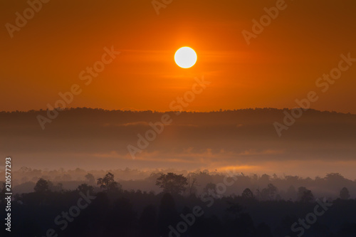 Colorful sky of sunrise above mountain on cloudy at winter season © pattierstock