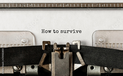 Text How to survive typed on retro typewriter