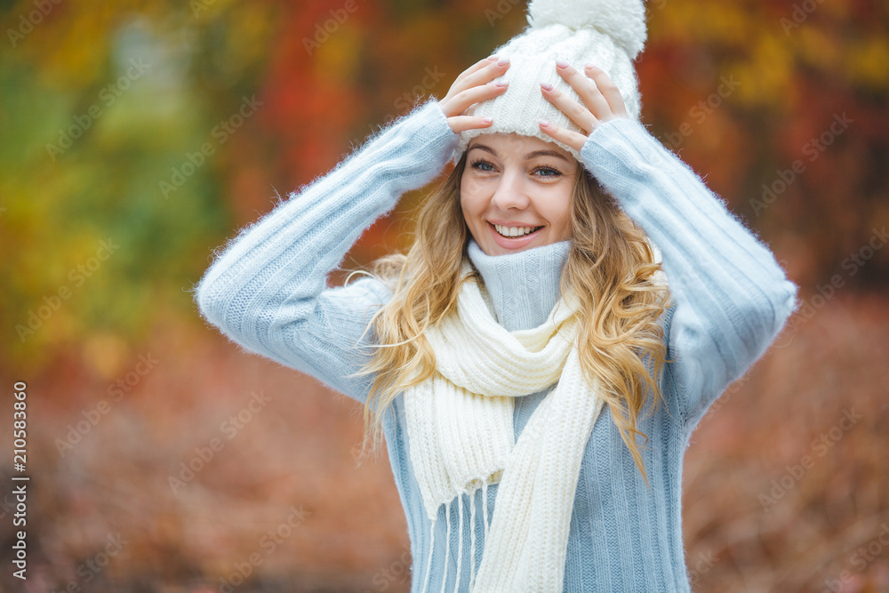 Young attractive woman in autumn colorful background Young attractive woman in autumn colorful background