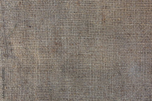 Old vintage linen cloth textile. Burlap rustic texture background.