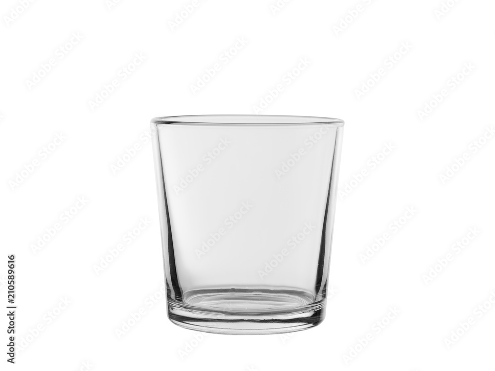 empty glass from transparent colourless glass, for cold drinks, isolated on a white background empty glass from transparent colourless glass, for cold drinks, isolated on a white background