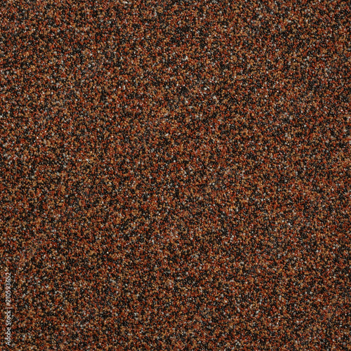 Textured background. Decorative plaster walls, exterior decoration of the facade. Texture color brown.