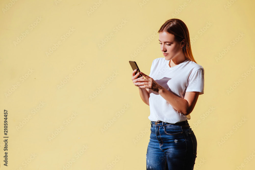 Portrait of smiling beautiful girl against of yellow background. Portrait of smiling beautiful girl against of yellow background.