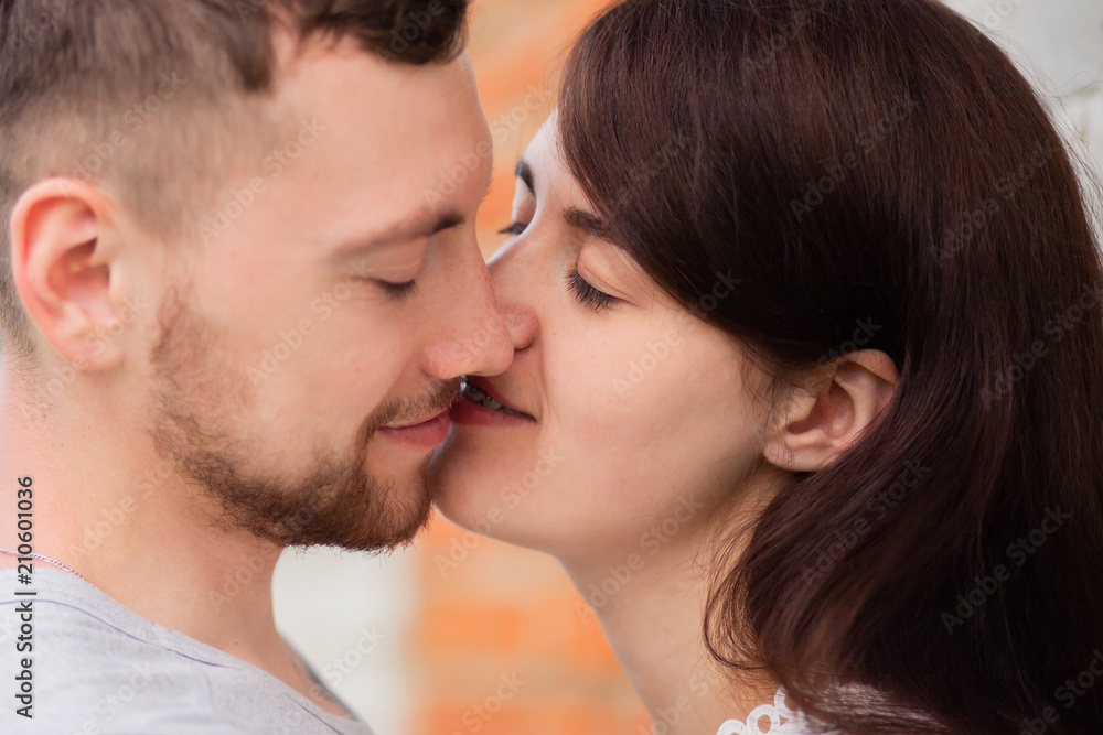 Closeup photo of kissing couple Closeup photo of kissing couple