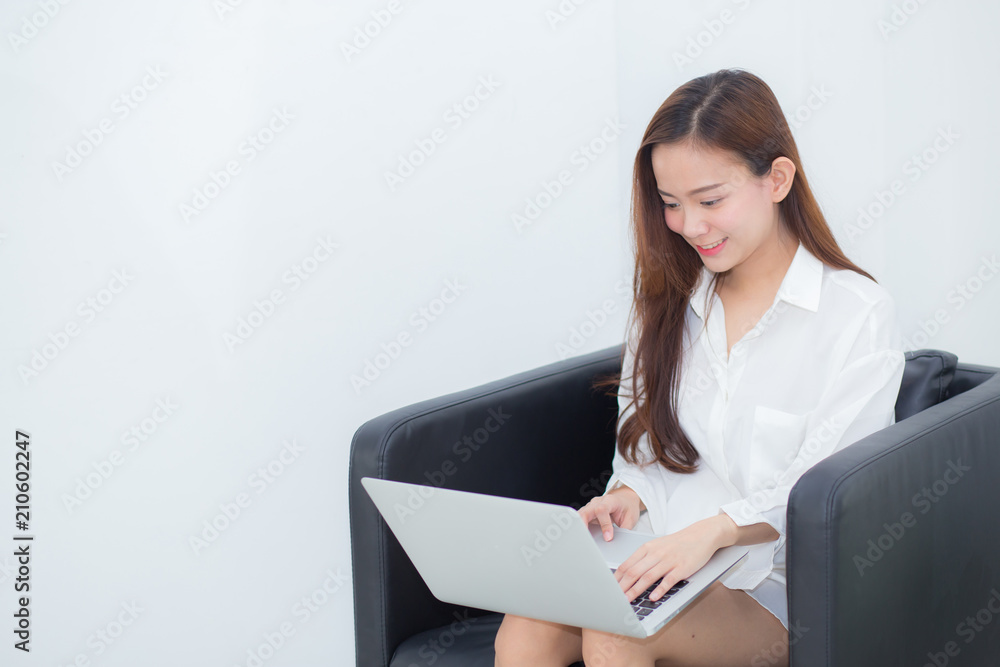 Beautiful of portrait young asian woman using laptop for leisure on sofa, girl working online internet with notebook freelance, communication business concept. Beautiful of portrait young asian woman using laptop for leisure on sofa, girl working online internet with notebook freelance, communication business concept.