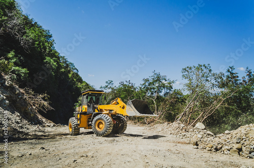 Road work with shovel loader in La Farola after landslide