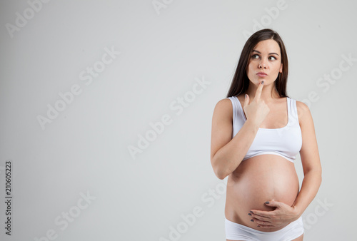 Pregnant woman be lost in thought
