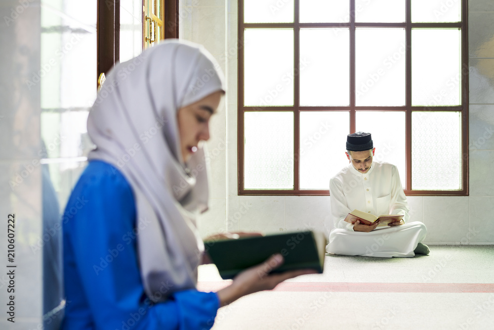 Muslims reading from the quran