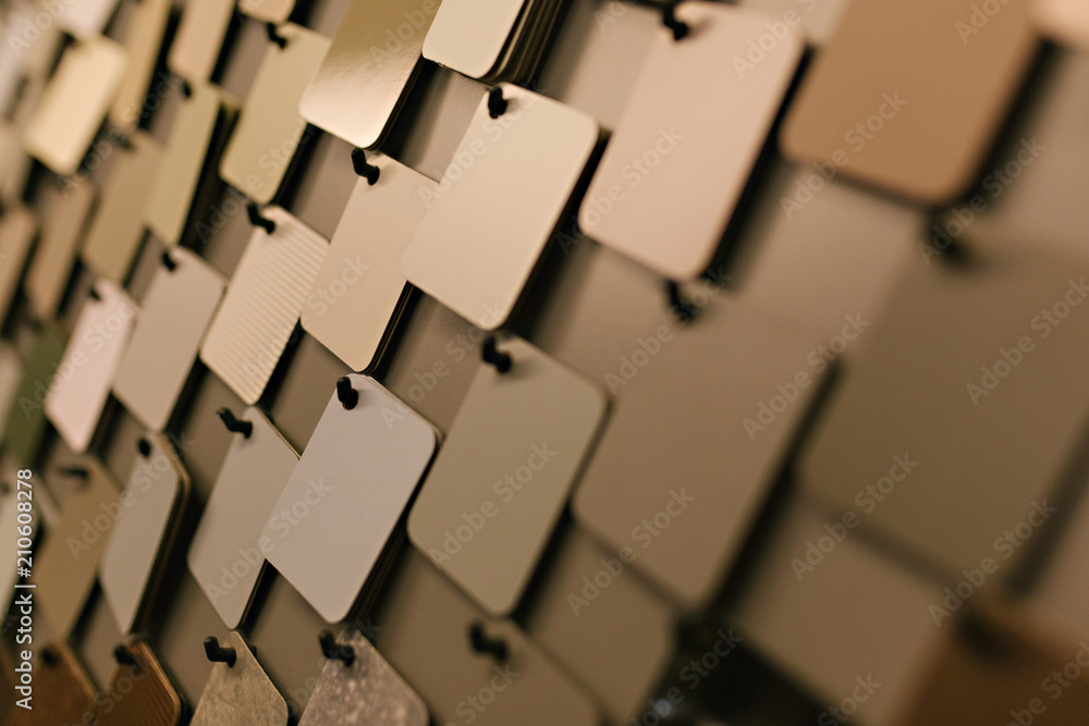 Obraz premium Gray neutral design tiles hanging up for show 