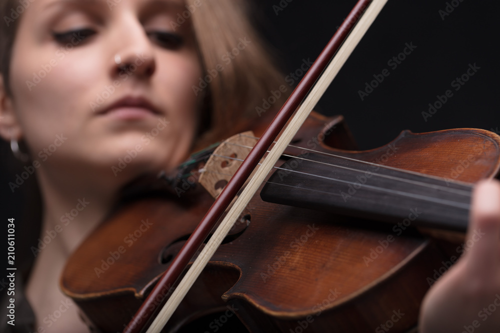 passionate violin musician playing on black background passionate violin musician playing on black background