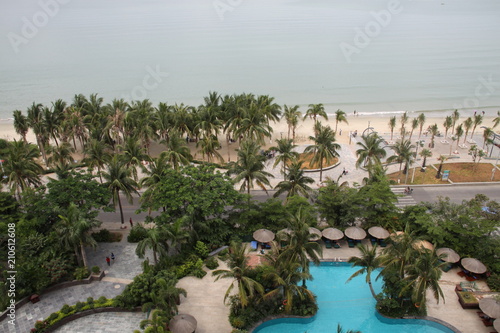 view from a hotel of a swimming pool and beach
