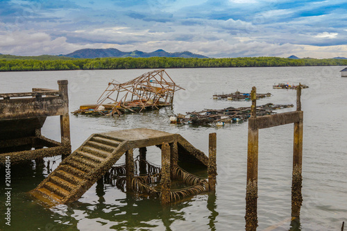 the broken pier in Ban Sam fishing village Phang Nga