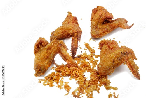 Top view group fried chicken wings drumstick with onions fried isolated on white background. Space for text in template. 