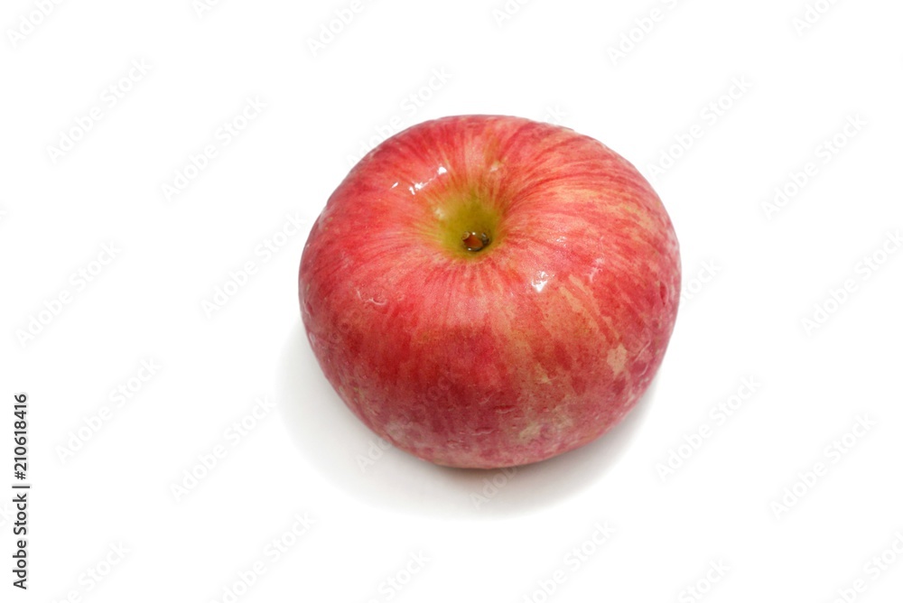 Top view of drops with red apple isolated on white background. Top view of drops with red apple isolated on white background.