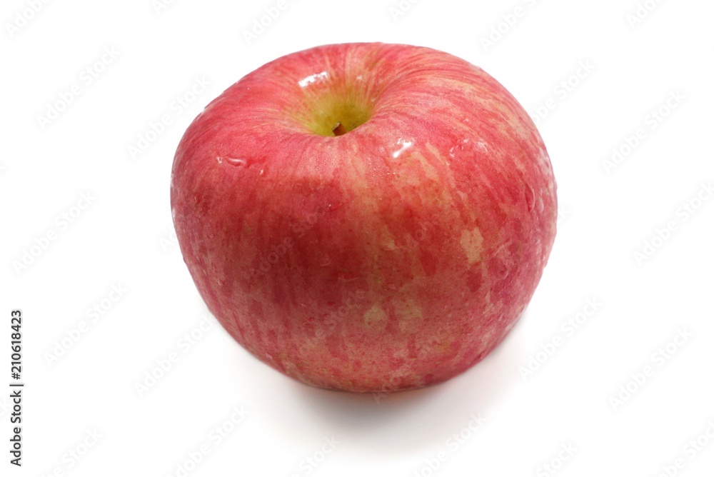 Top view of drops with red apple isolated on white background. Top view of drops with red apple isolated on white background.