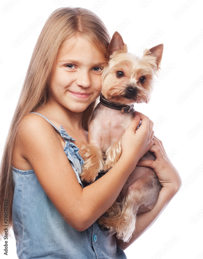 Happy girl holding her lovely yorkshire terrier dog. Happy girl holding her lovely yorkshire terrier dog.
