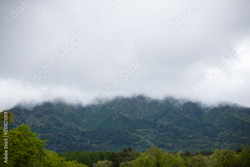 cloud moving through the mountain valley