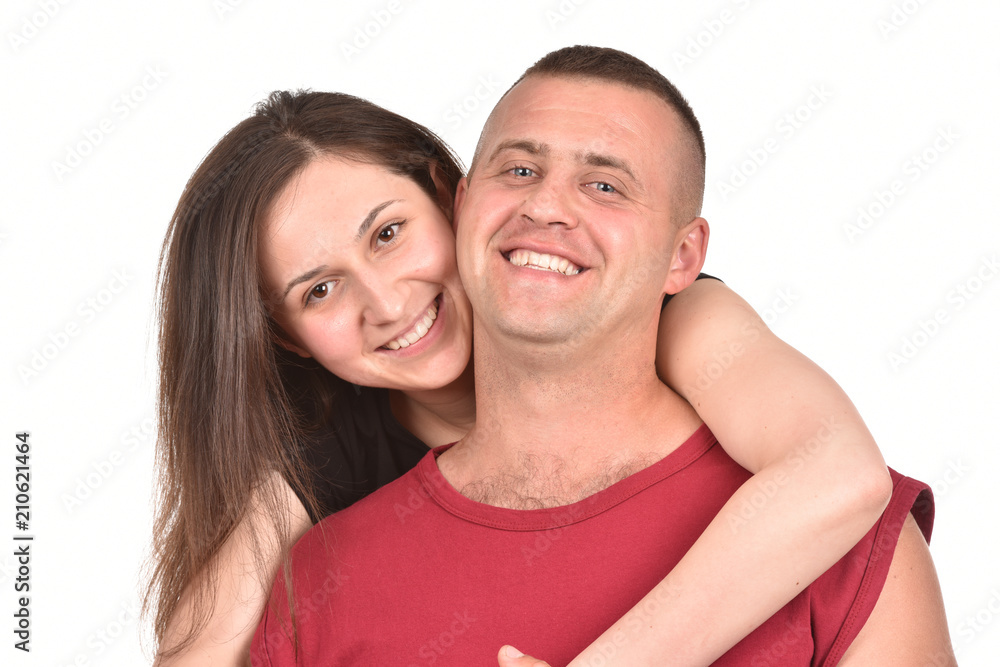 Young family on a white background. Perfect pair. A good relationship. Strong friendship. Young family on a white background. Perfect pair. A good relationship. Strong friendship.