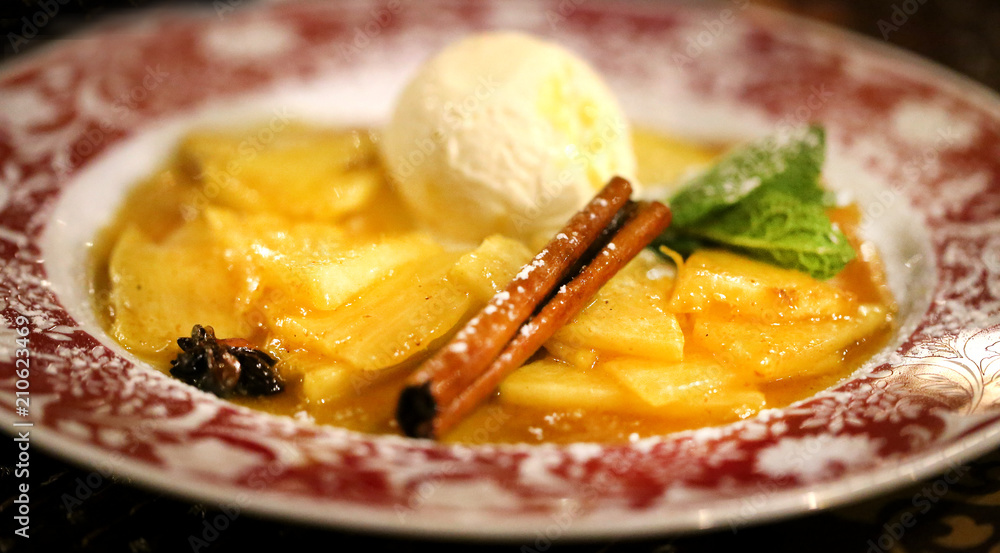 Fototapeta premium Photo of a close-up pineapple sweet with ice cream