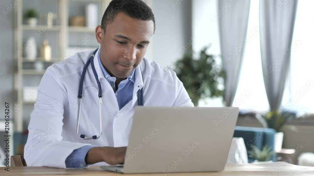 African-American Doctor Working On Laptop African-American Doctor Working On Laptop