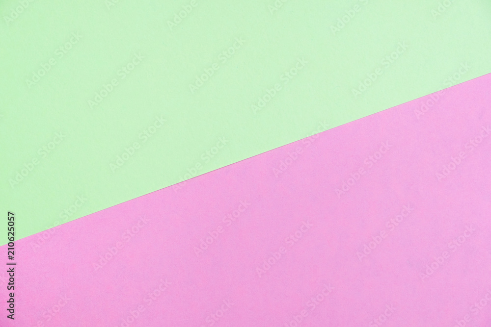 Pastel colored paper flat lay top view, background texture, green and pink Pastel colored paper flat lay top view, background texture, green and pink