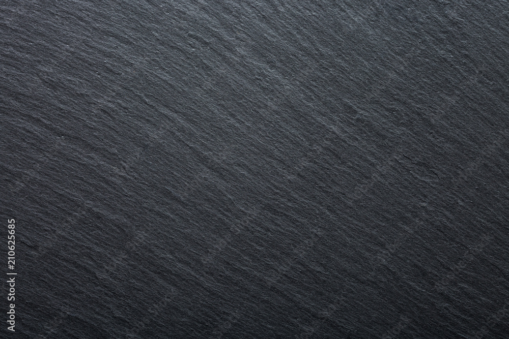 Naklejka premium Dark grey and black slate granite background. Texture background for your project.