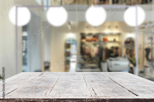Wallpaper Mural Selected focus empty brown wooden table and Coffee shop or restaurant blur background with bokeh image. for your photomontage or product display Torontodigital.ca