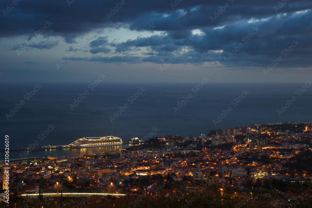 After sunset panoramic view to Funchal with atlantic ocean and cruise ship, Madeira