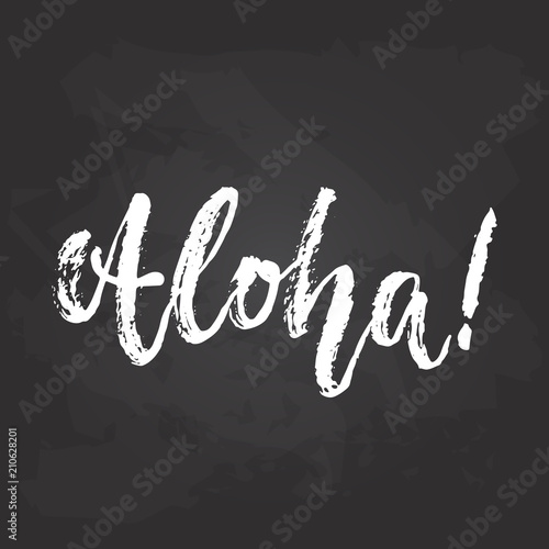 Aloha - hand drawn seasons holiday lettering phrase isolated on the black chalkboard background. Fun brush ink vector illustration for banners, greeting card, poster design.