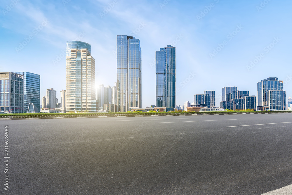 Air highway asphalt road and office building of commercial building in modern city