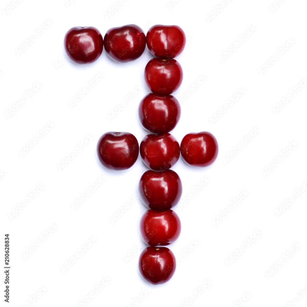 Number seven. A figure composed of cherries isolated on a white background. Number seven. A figure composed of cherries isolated on a white background.