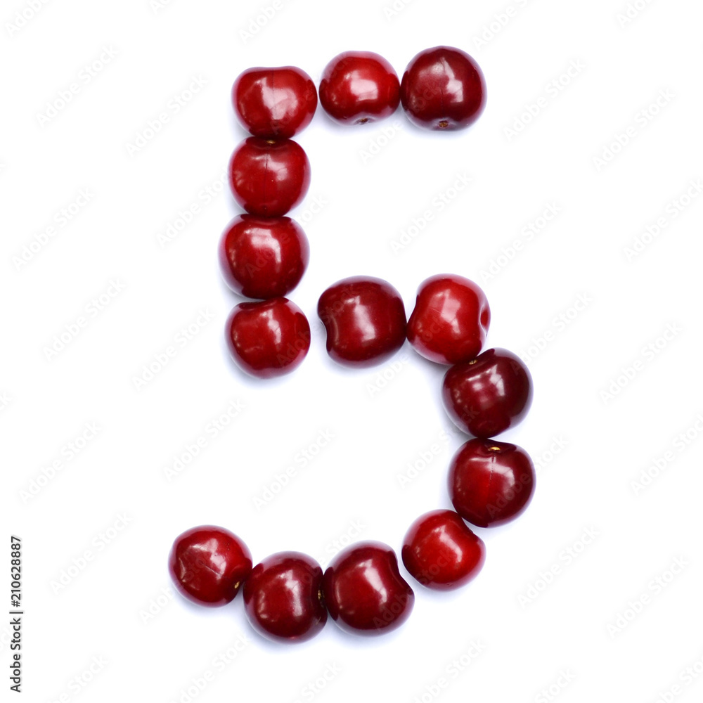 Number five. A figure composed of cherries isolated on a white background. Number five. A figure composed of cherries isolated on a white background.