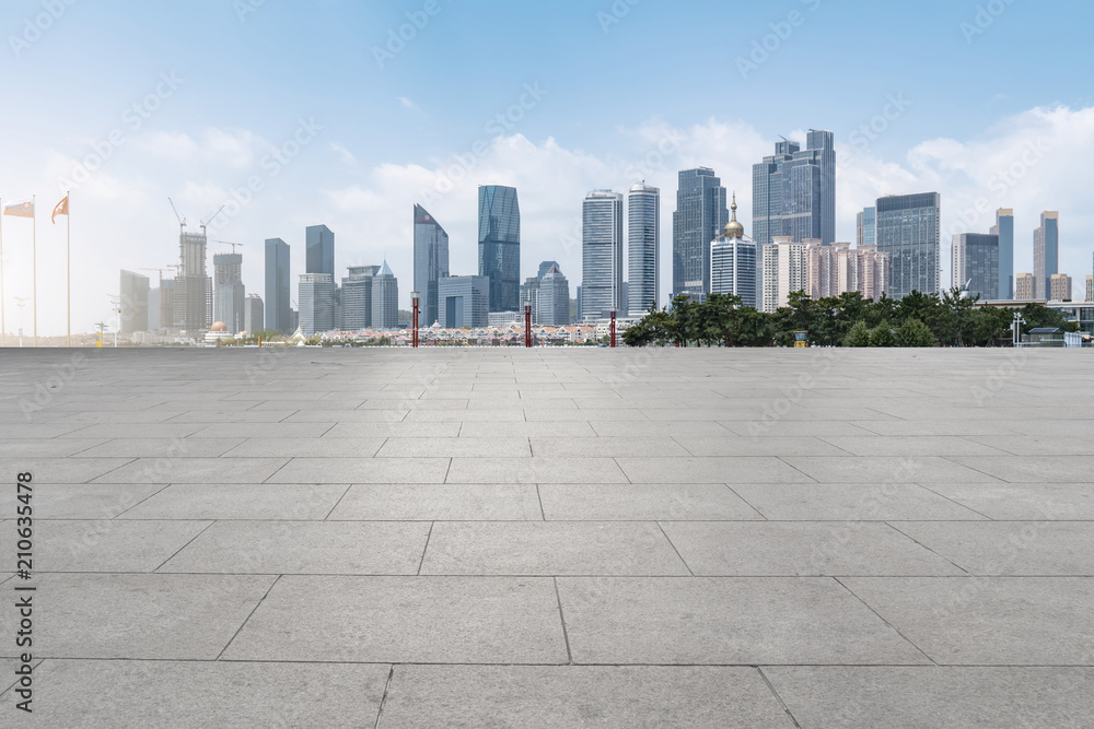 empty marble floor and cityscape of in blue cloud sky empty marble floor and cityscape of in blue cloud sky