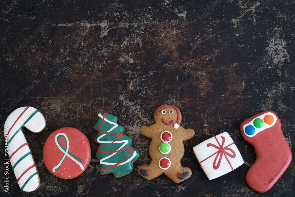 Assortment of Christmas Gingerbread on Tray with Dark Background with Copy Space Top