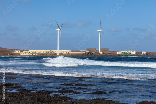 Modern windmills on the beach