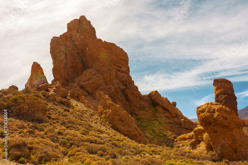 Teide National Park. Beautiful view of volcano mountain rocks desert crater near El Teide, highest volcano in the Atlantic Ocean Canary islands on a sunny day and blue sky. Tenerife, Canary Islands