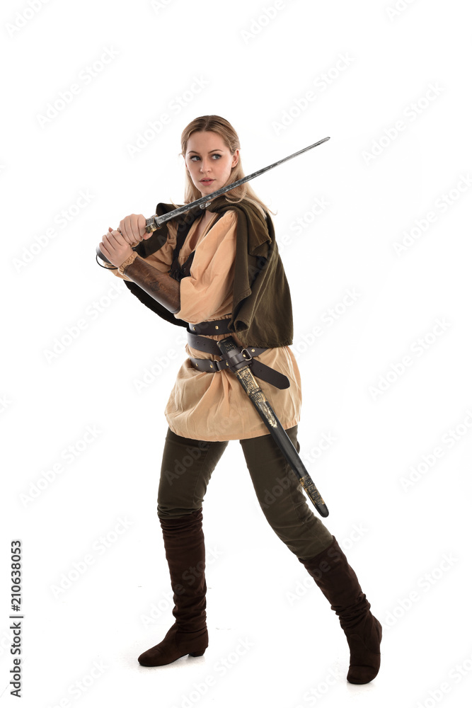 full length portrait of girl wearing brown medieval costume,. standing pose, isolated on white studio background. full length portrait of girl wearing brown medieval costume,. standing pose, isolated on white studio background.
