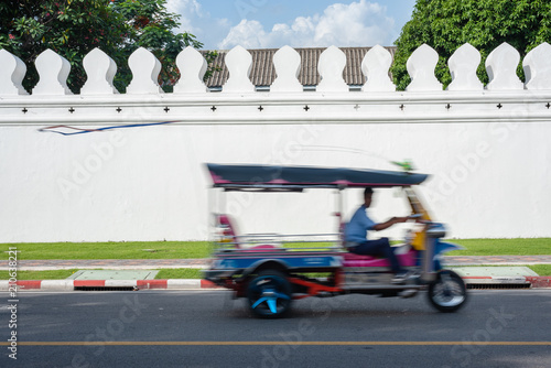 Photography tuk tuk car on the road in bangkok, speed motion
