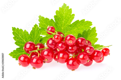 Ripe and juicy red currant berries with leaves isolated on white background. Healthy food.