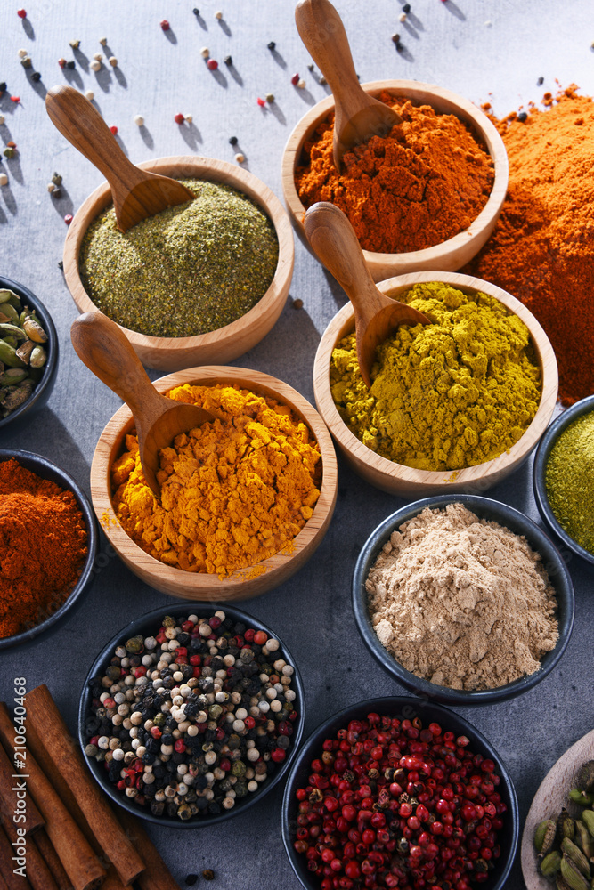Variety of spices on kitchen table Variety of spices on kitchen table