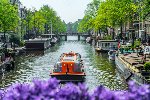 View of a canal in Amsterdam with boats