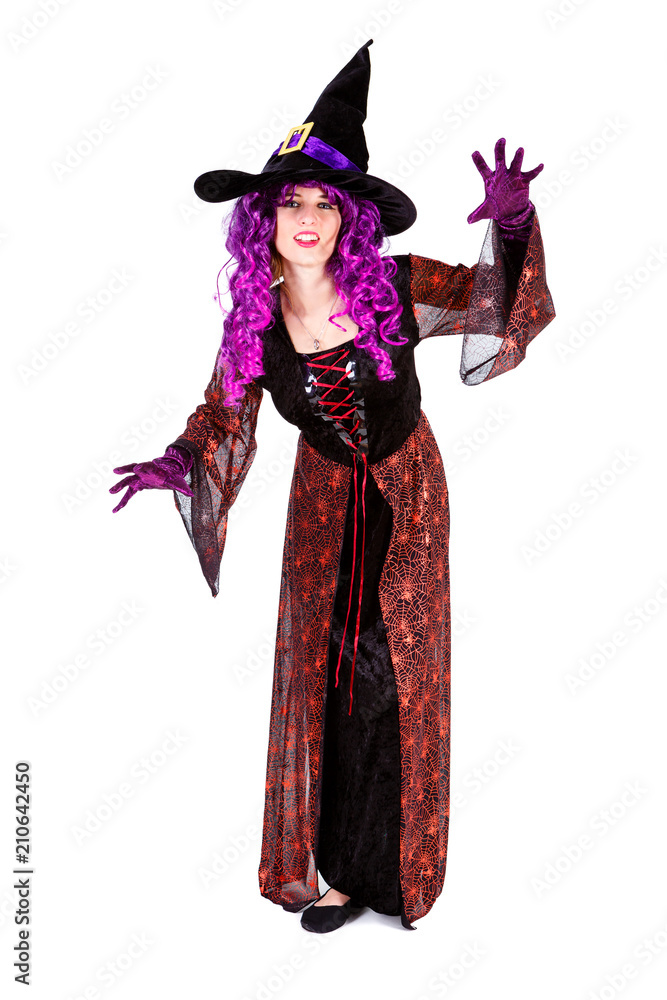 Young lady dressed in Halloween witch costum carnaval, show emotions of witch on white isolated background