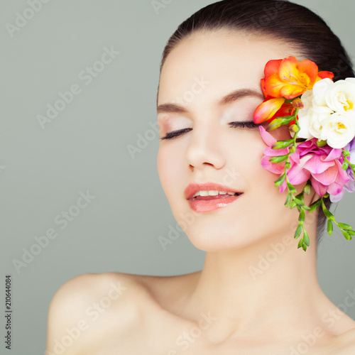 Spa Woman Face with Flowers  Closeup Portrait