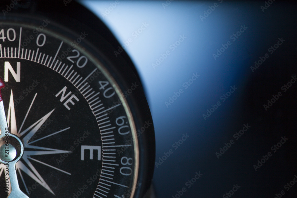 Vintage compass in blue background